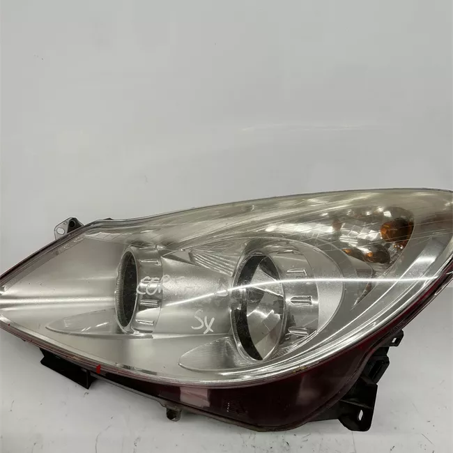 Proiettore sinistro Cromo