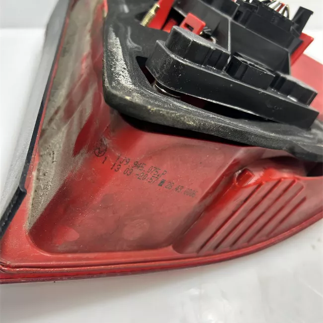 Fanale posteriore sinistro giallo/rosso