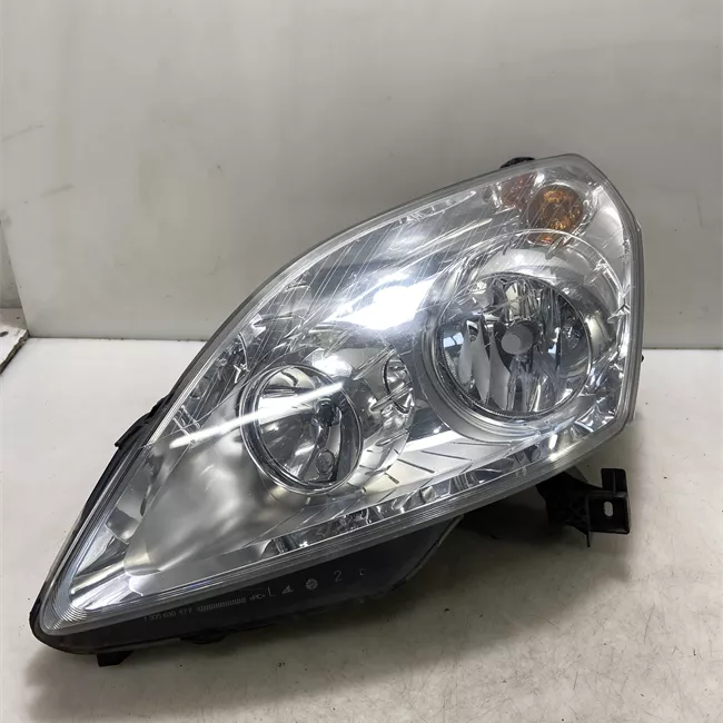 Proiettore sinistro t.82093335>