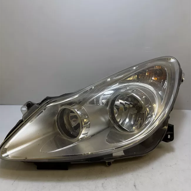 Proiettore sinistro Cromo