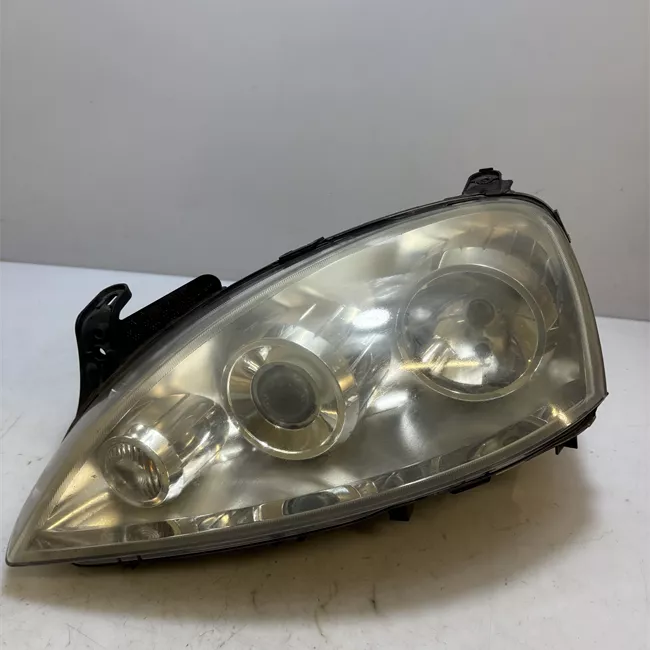 Proiettore sinistro t. 53000001>