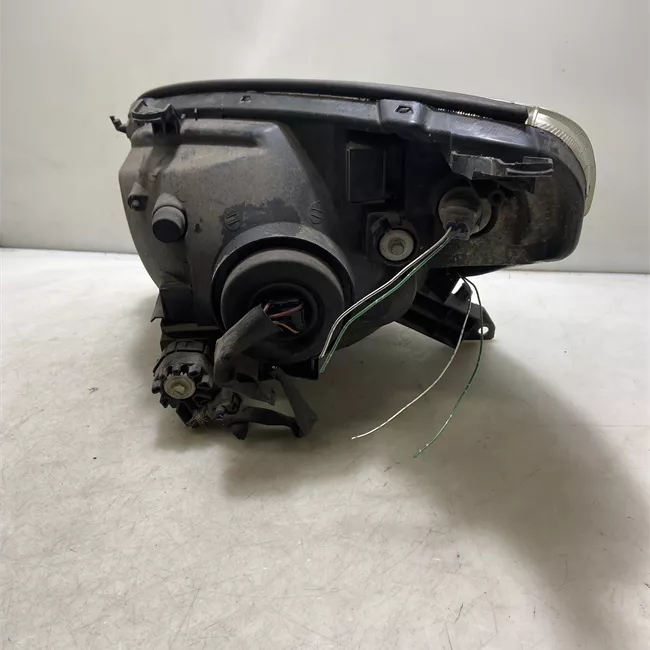 Proiettore destro 07-03> regol.altezza