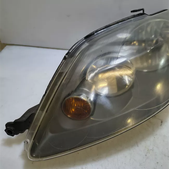 Proiettore sinistro HELLA