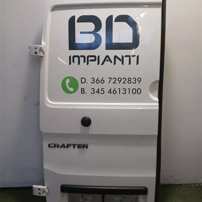 Porta carico posteriore a battente sinistra Lamierata
