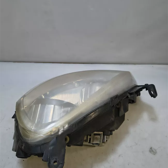 Proiettore sinistro t. 64000001>