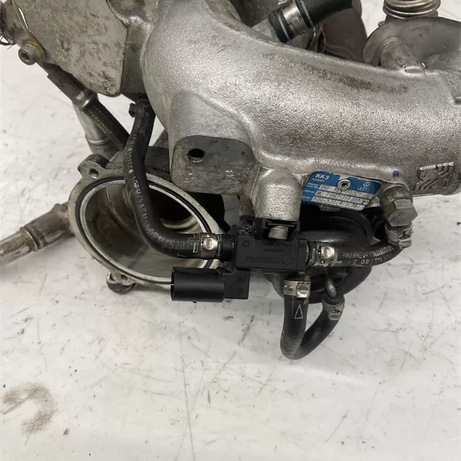 Turbocompressore con collettore scarico