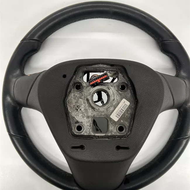 Volante Pelle con modanatura cromata nero