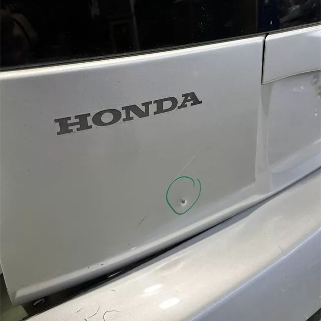 Portello posteriore con spoiler