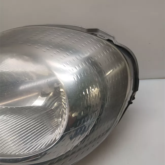 Proiettore sinistro t.6V699999<