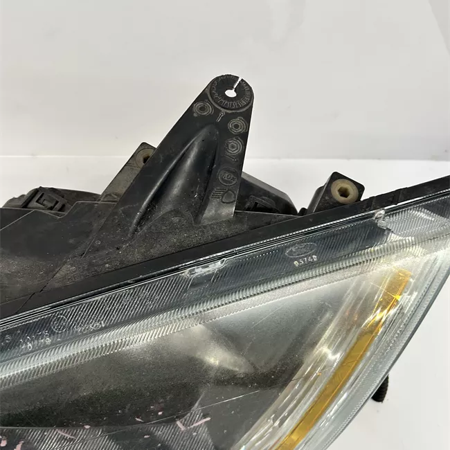 Proiettore sinistro con indicatore lat direz con cornice