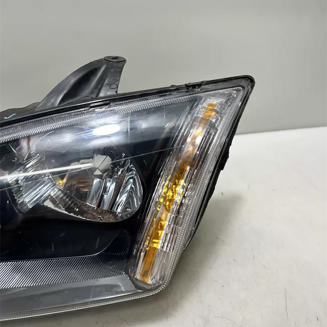 Proiettore sinistro con indicatore lat direz con cornice