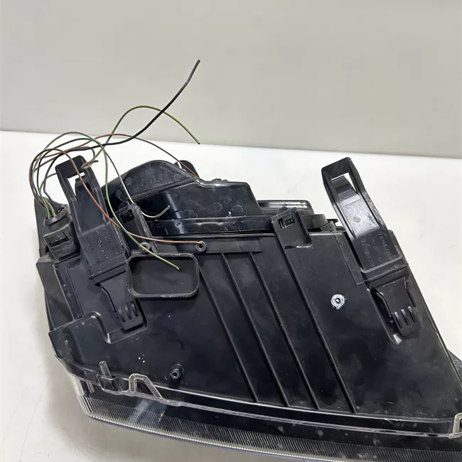 Proiettore sinistro con indicatore lat direz con cornice