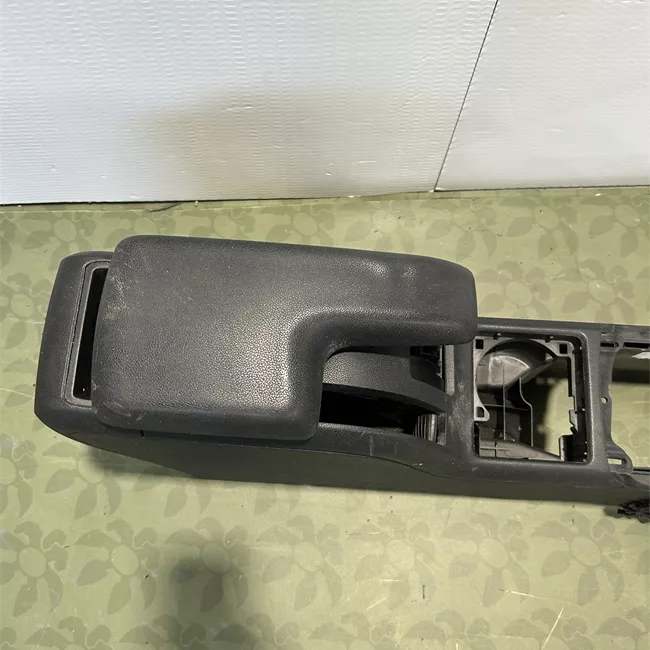 Consolle centrale con bracciolo ribaltabile