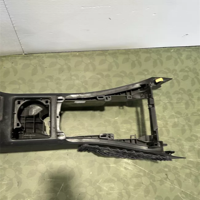 Consolle centrale con bracciolo ribaltabile