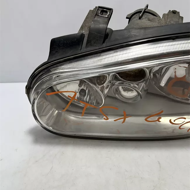 Proiettore sinistro Hella