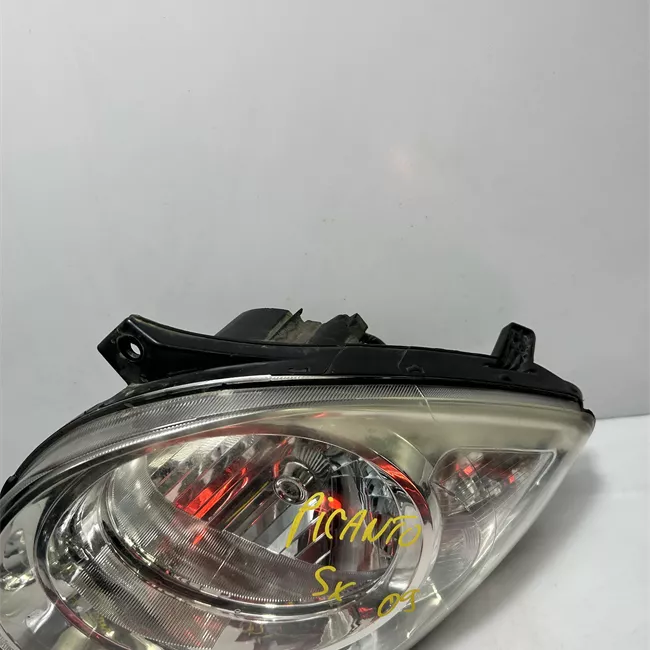 Proiettore sinistro con regolazione manuale altezza faro