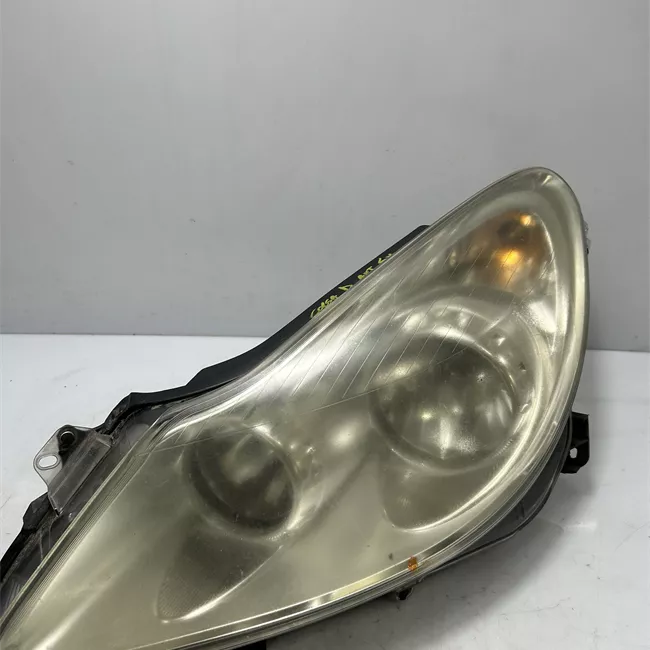 Proiettore sinistro Cromo