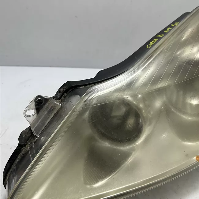 Proiettore sinistro Cromo