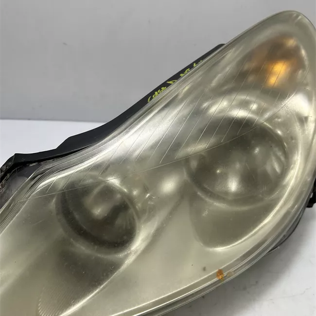 Proiettore sinistro Cromo