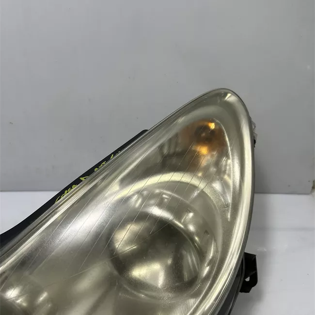 Proiettore sinistro Cromo