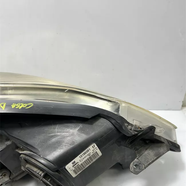 Proiettore sinistro Cromo