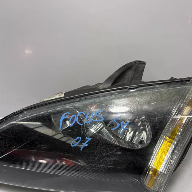 Proiettore sinistro con indicatore lat direz con cornice