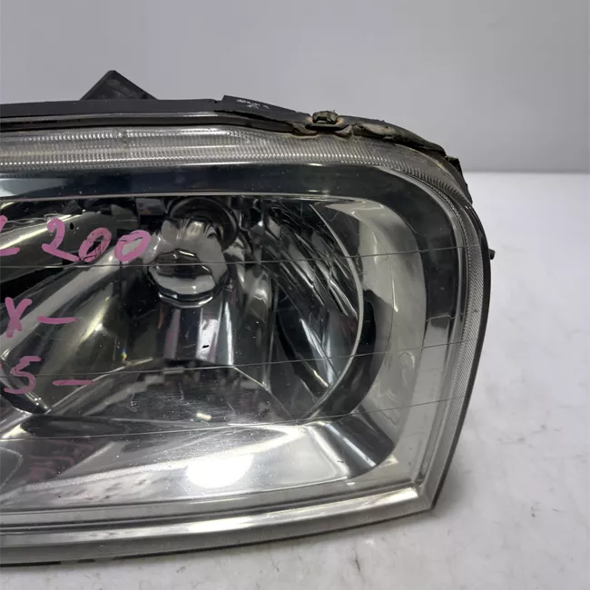 Proiettore sinistro con motorino regolazione altezza