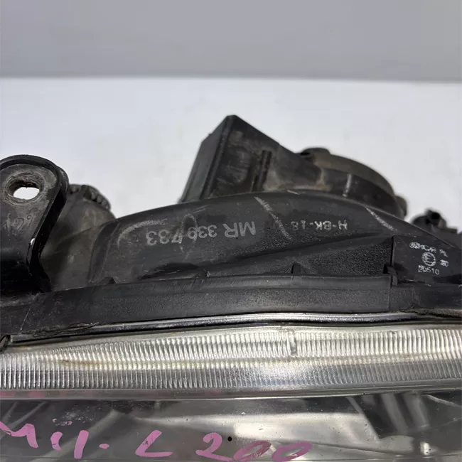 Proiettore sinistro con motorino regolazione altezza