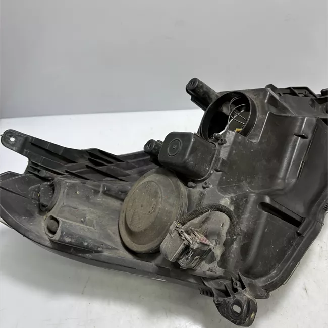 Proiettore sinistro Cromo