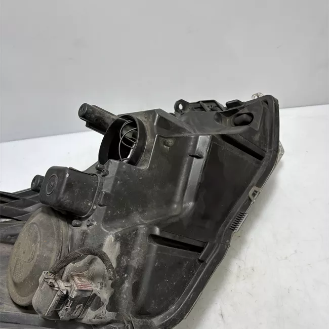 Proiettore sinistro Cromo