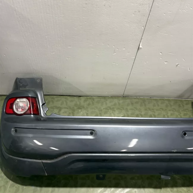 Paraurti posteriore centrale superiore con sensore parcheggio primer