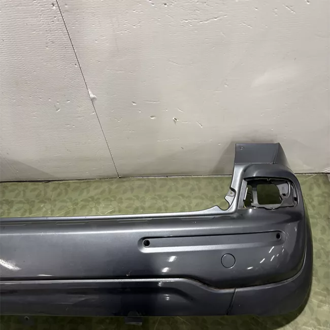 Paraurti posteriore centrale superiore con sensore parcheggio primer