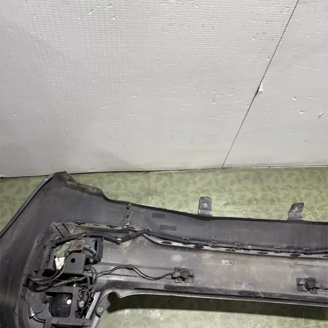 Paraurti posteriore centrale superiore con sensore parcheggio primer