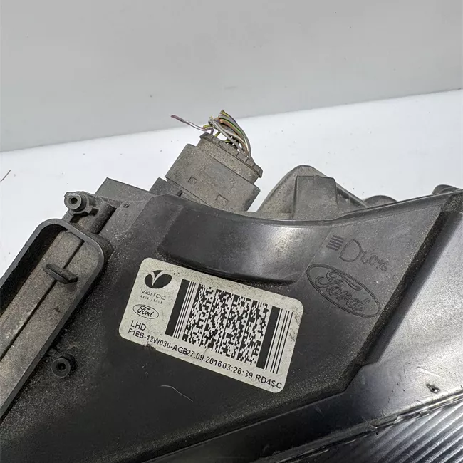 Proiettore sinistro con cornice nera