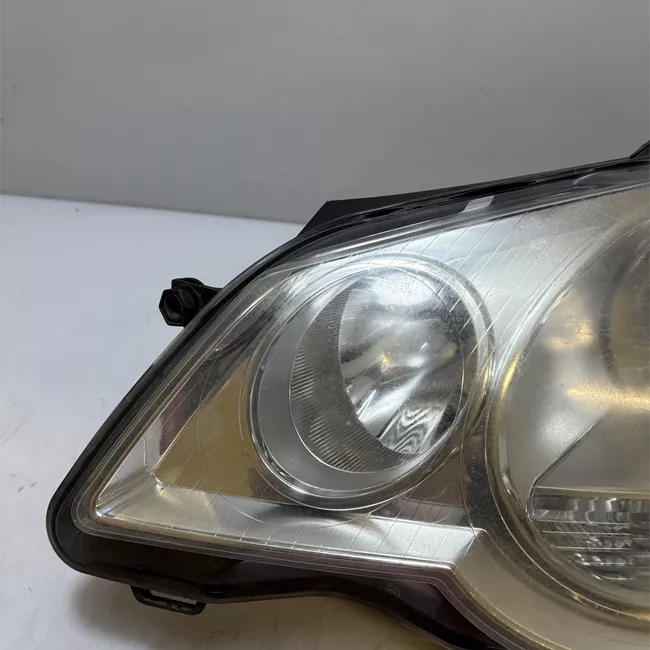 Proiettore sinistro Hella