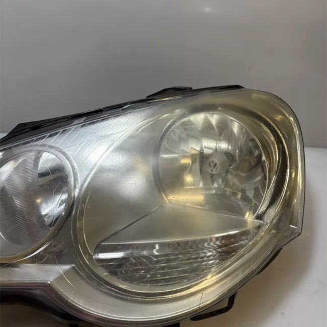 Proiettore sinistro Hella