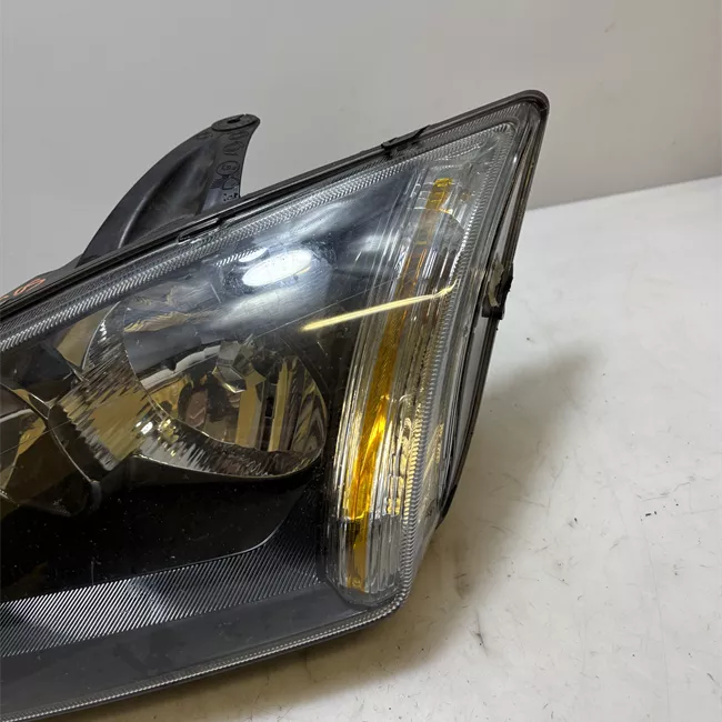 Proiettore sinistro con indicatore lat direz con cornice