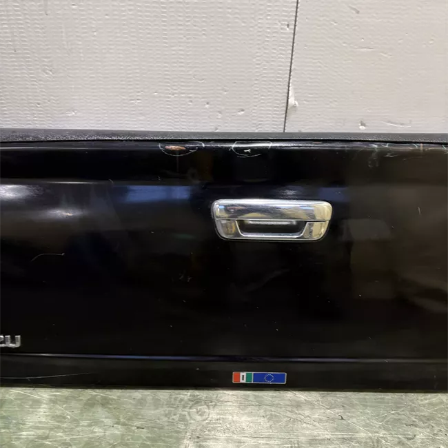 Rivestimento posteriore ribaltabile