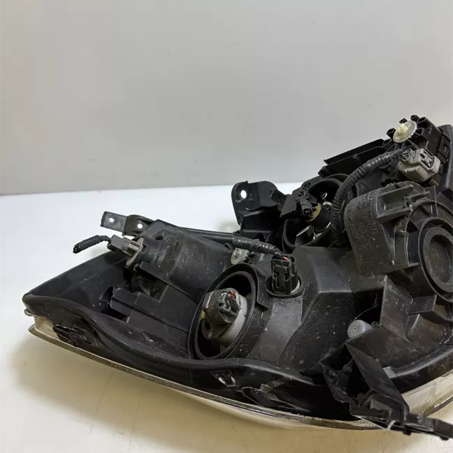 Proiettore con regolatore altezza sinistro