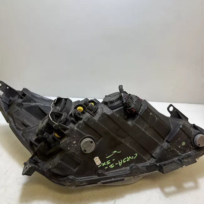 Proiettore sinistro cromo