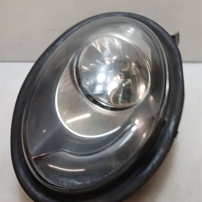 Proiettore sinistro con indicatore direzione bianchi