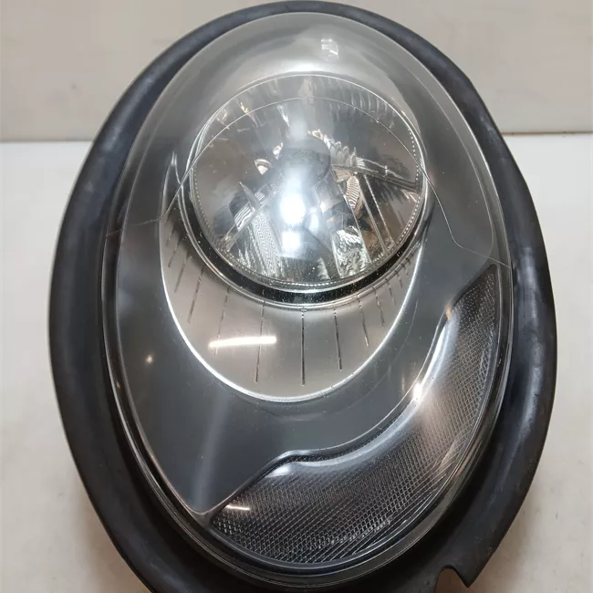 Proiettore sinistro con indicatore direzione bianchi