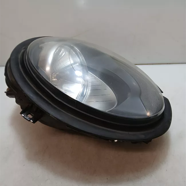 Proiettore sinistro con indicatore direzione bianchi