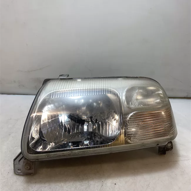 Proiettore con regolatore altezza sinistro