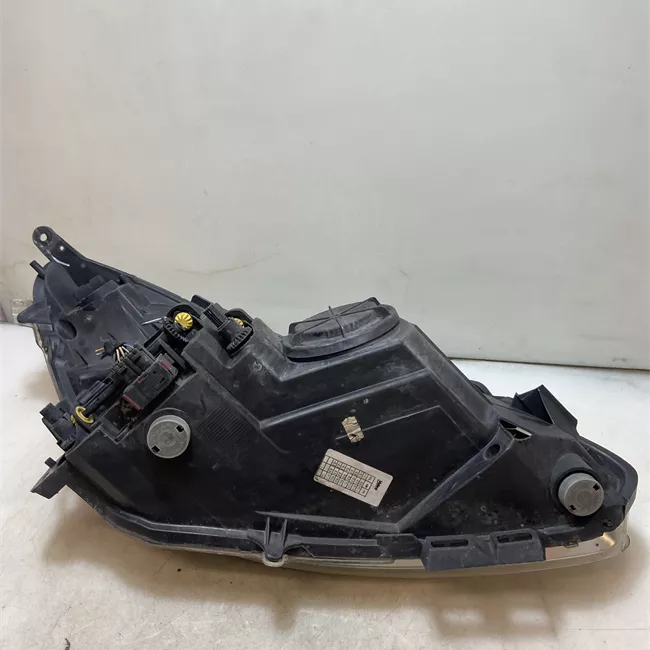 Proiettore sinistro Cromo