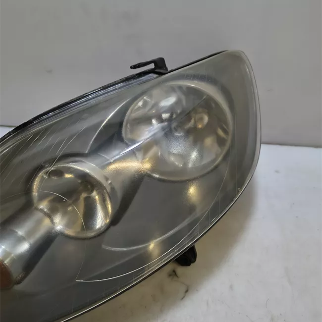 Proiettore sinistro HELLA