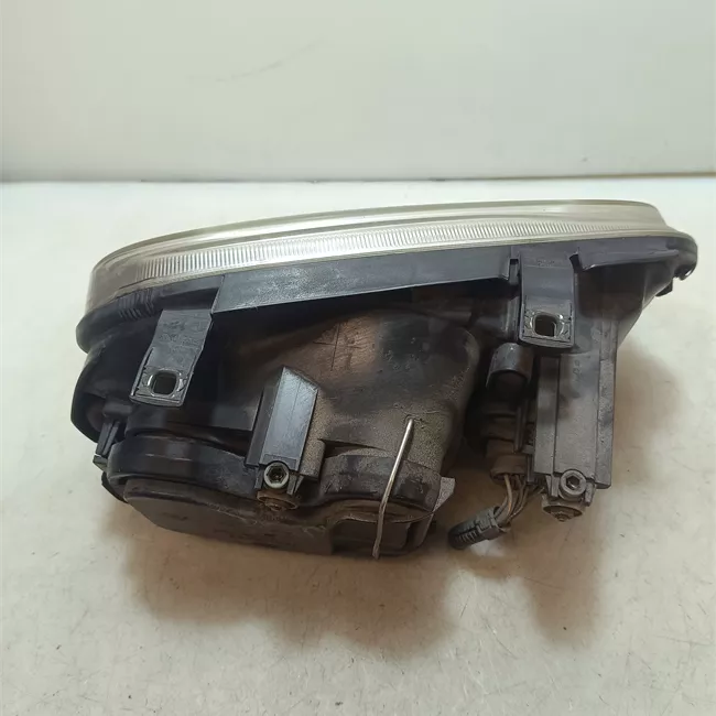 Proiettore sinistro Hella