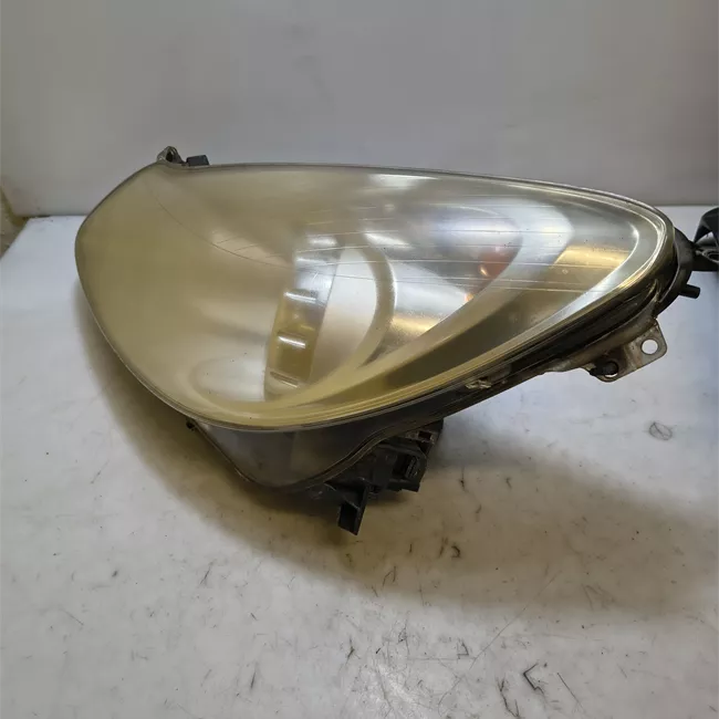 Proiettore sinistro cromo