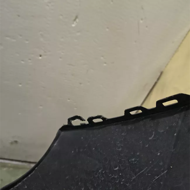 Paraurti anteriore grigio