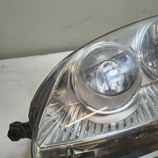 Proiettore sinistro AL cromato